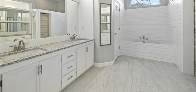 28707 Raleigh Pl, Wesley Chapel, FL 33545 - full bath featuring marble finish flooring, a bath, and double vanity