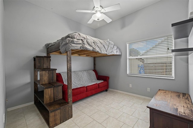 28707 Raleigh Pl, Wesley Chapel, FL 33545 - bedroom with light tile patterned floors and a ceiling fan