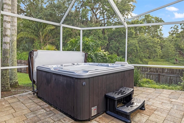 28707 Raleigh Pl, Wesley Chapel, FL 33545 - view of patio featuring a hot tub and a lanai