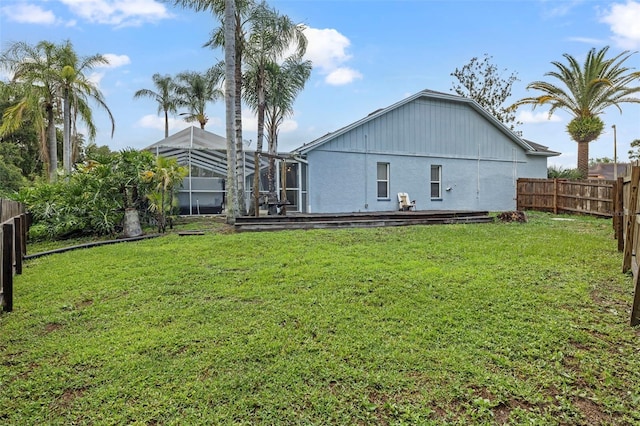 28707 Raleigh Pl, Wesley Chapel, FL 33545 - rear view of property featuring glass enclosure