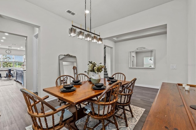 3179 Sailing Pier Ave, Winter Garden, FL 34787 - dining space featuring dark wood finished floors and recessed lighting