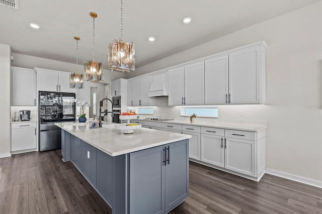 3179 Sailing Pier Ave, Winter Garden, FL 34787 - kitchen featuring smart refrigerator, a chandelier, dark wood-style floors, white cabinetry, and recessed lighting