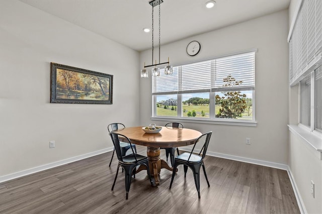 3179 Sailing Pier Ave, Winter Garden, FL 34787 - dining room with dark wood-style flooring, recessed lighting, and a chandelier