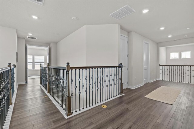 3179 Sailing Pier Ave, Winter Garden, FL 34787 - corridor with an upstairs landing, recessed lighting, healthy amount of natural light, and wood finished floors