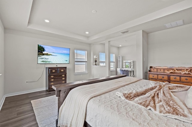 3179 Sailing Pier Ave, Winter Garden, FL 34787 - bedroom with dark wood finished floors, recessed lighting, and a tray ceiling