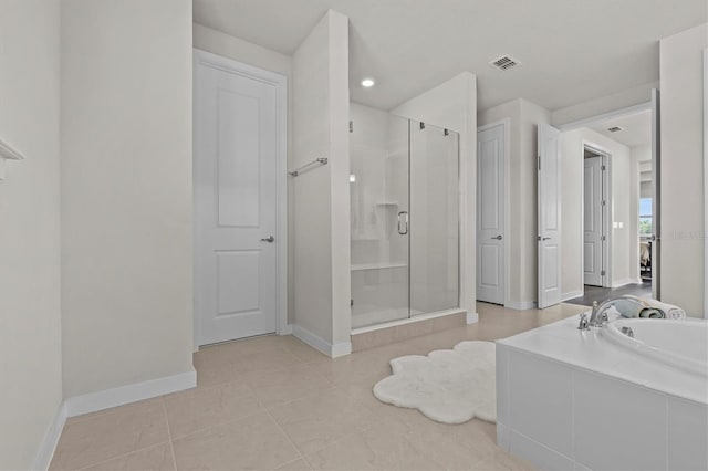 3179 Sailing Pier Ave, Winter Garden, FL 34787 - full bathroom with a stall shower, a garden tub, tile patterned floors, and recessed lighting