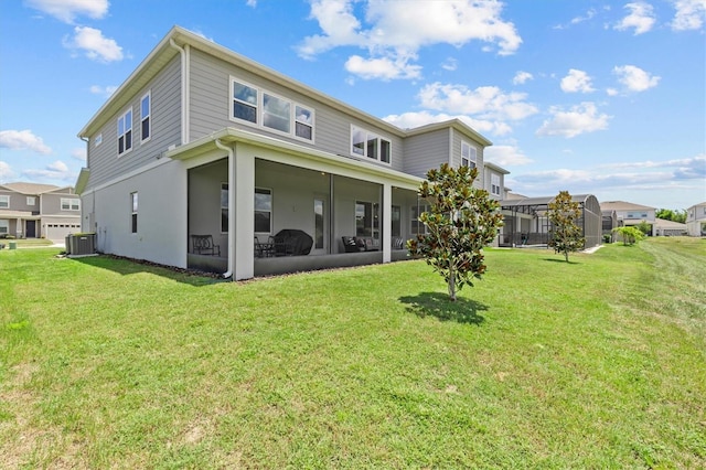3179 Sailing Pier Ave, Winter Garden, FL 34787 - back of property with a lawn and a sunroom