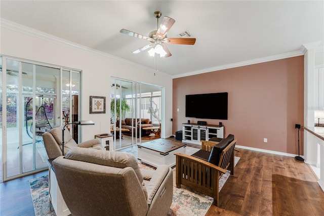 2173 Caledonian St, Clermont, FL 34711 - living room with ornamental molding, wood finished floors, and ceiling fan