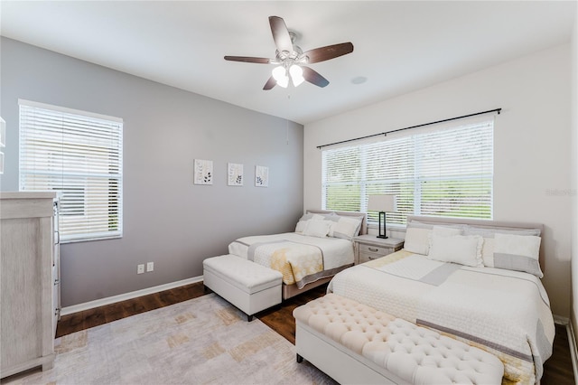 2173 Caledonian St, Clermont, FL 34711 - bedroom with wood finished floors and a ceiling fan