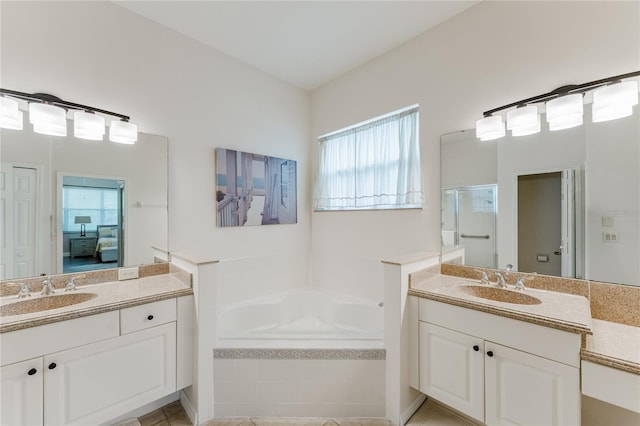 2173 Caledonian St, Clermont, FL 34711 - ensuite bathroom with two vanities, a garden tub, and a shower stall