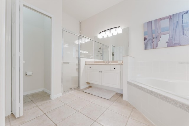 2173 Caledonian St, Clermont, FL 34711 - full bath featuring vanity, a shower stall, a bath, and tile patterned floors