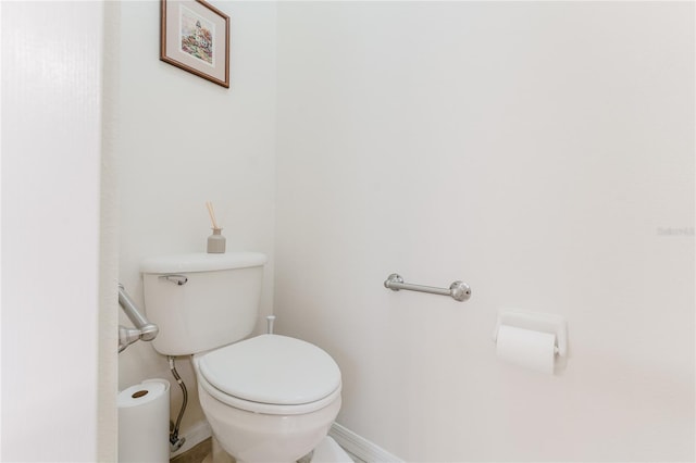 2173 Caledonian St, Clermont, FL 34711 - bathroom with toilet and baseboards