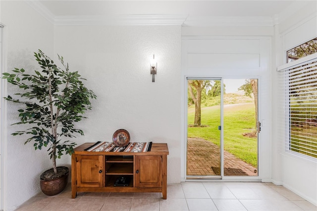 2173 Caledonian St, Clermont, FL 34711 - doorway with ornamental molding, healthy amount of natural light, and light tile patterned floors