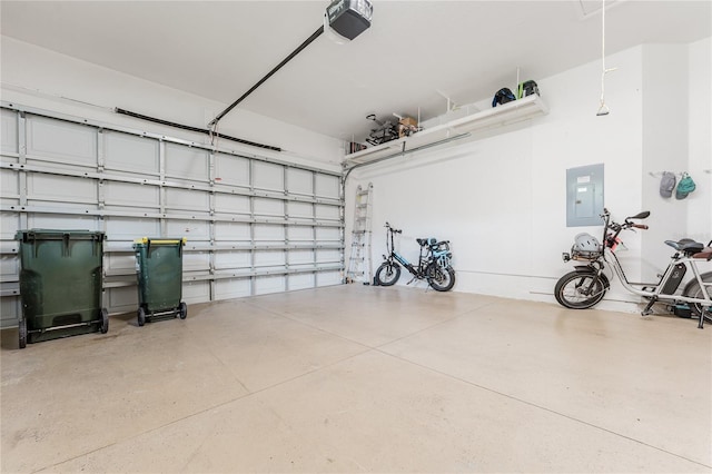 2173 Caledonian St, Clermont, FL 34711 - garage with electric panel and a garage door opener