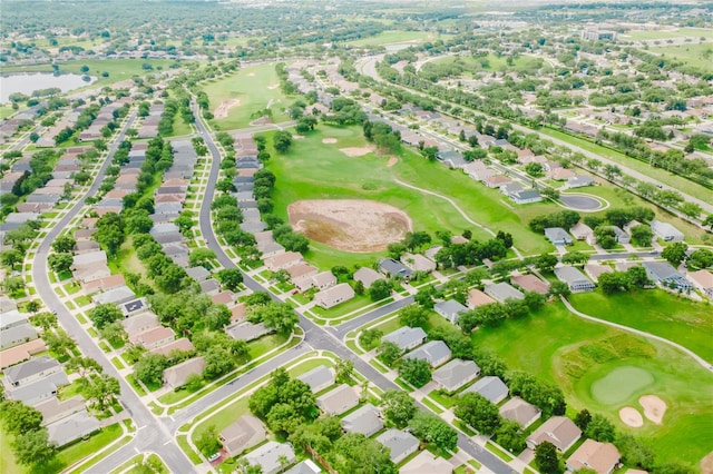 2173 Caledonian St, Clermont, FL 34711 - aerial view of residential area with a golf course and a nearby body of water