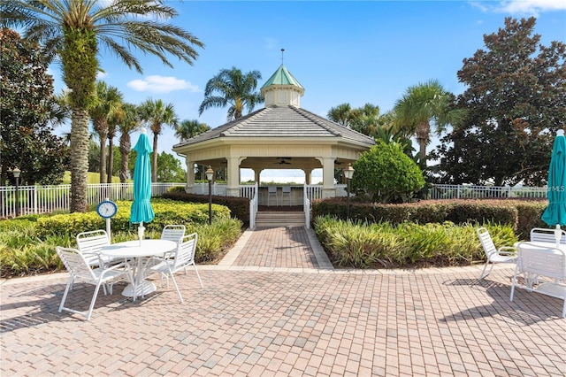 2173 Caledonian St, Clermont, FL 34711 - view of home's community with outdoor dining space and a patio