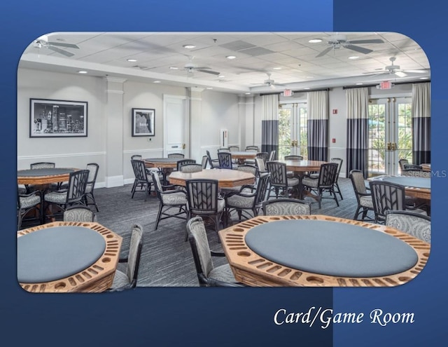 2173 Caledonian St, Clermont, FL 34711 - dining area featuring a ceiling fan, a paneled ceiling, and carpet