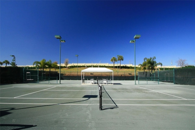 2173 Caledonian St, Clermont, FL 34711 - view of tennis court with community basketball court