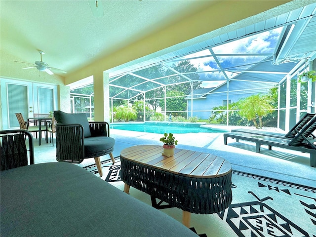 5205 Hammock Cir, Saint Cloud, FL 34771 - swimming pool with a ceiling fan, a patio, glass enclosure, and outdoor dining area
