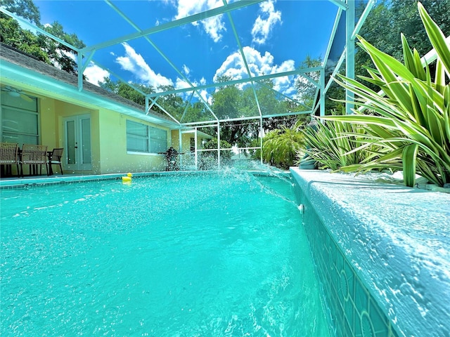 5205 Hammock Cir, Saint Cloud, FL 34771 - outdoor pool with french doors and glass enclosure