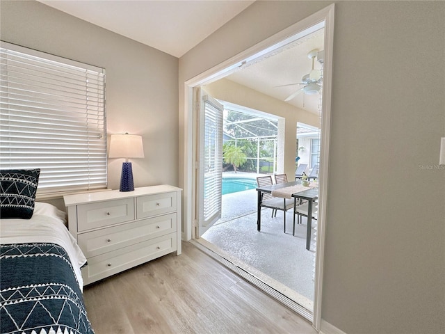 5205 Hammock Cir, Saint Cloud, FL 34771 - bedroom with access to outside, light wood finished floors, and a sunroom