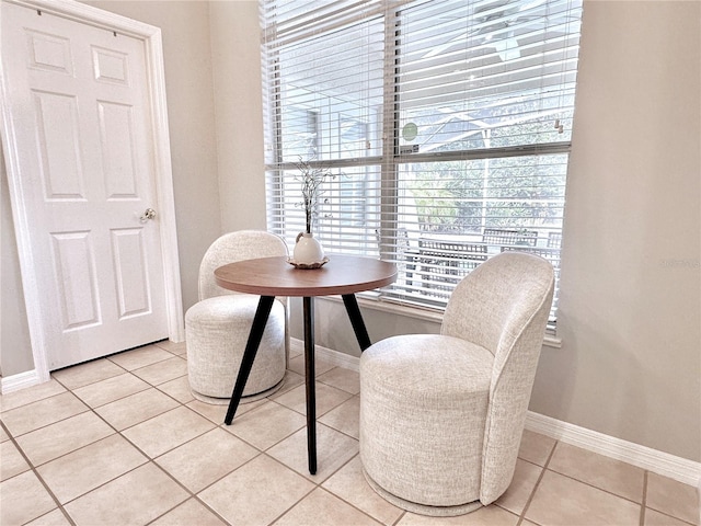 5205 Hammock Cir, Saint Cloud, FL 34771 - dining room with baseboards and light tile patterned floors