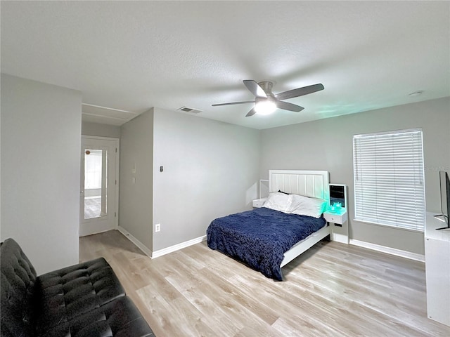 5205 Hammock Cir, Saint Cloud, FL 34771 - bedroom with light wood finished floors and a ceiling fan