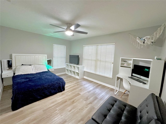 5205 Hammock Cir, Saint Cloud, FL 34771 - bedroom featuring wood finished floors, a desk, and ceiling fan
