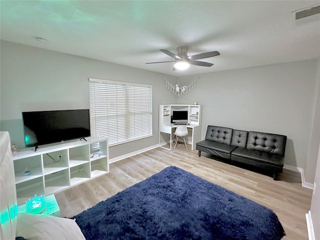 5205 Hammock Cir, Saint Cloud, FL 34771 - living room featuring a ceiling fan, wood finished floors, and an office area
