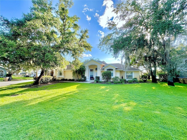 5205 Hammock Cir, Saint Cloud, FL 34771 - ranch-style home featuring a front lawn and stucco siding