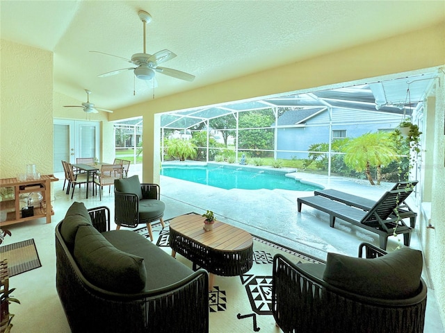 5205 Hammock Cir, Saint Cloud, FL 34771 - swimming pool with an outdoor hangout area, ceiling fan, a patio area, glass enclosure, and outdoor dining area
