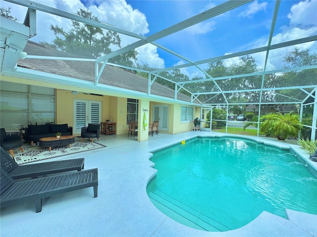 5205 Hammock Cir, Saint Cloud, FL 34771 - swimming pool featuring an outdoor hangout area, french doors, a patio, ceiling fan, and a lanai