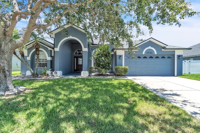 1031 Seneca Trl, Saint Cloud, FL 34772 - ranch-style home featuring stucco siding, a garage, and concrete driveway