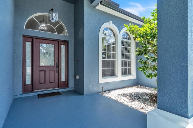 1031 Seneca Trl, Saint Cloud, FL 34772 - view of exterior entry with stucco siding