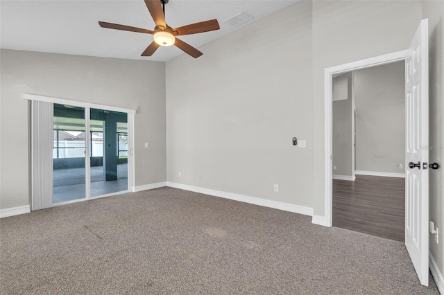 1031 Seneca Trl, Saint Cloud, FL 34772 - empty room with a ceiling fan, lofted ceiling, and carpet flooring