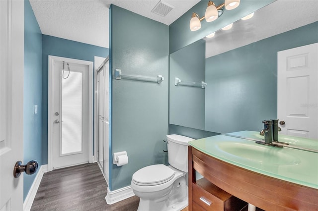 1031 Seneca Trl, Saint Cloud, FL 34772 - bathroom featuring wood finished floors, a stall shower, and vanity