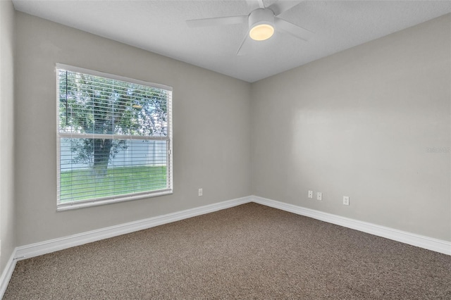 1031 Seneca Trl, Saint Cloud, FL 34772 - carpeted empty room with a ceiling fan and baseboards