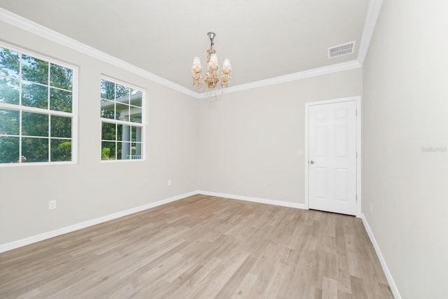5552 Remsen Cay Ln, Windermere, FL 34786 - unfurnished room featuring light wood-style flooring, a chandelier, and crown molding