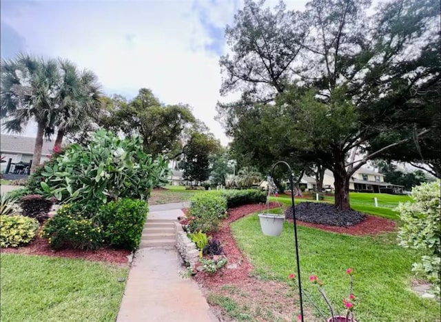 1034 Villa Ln Unit 18, Apopka, FL 32712 - view of home's community featuring a yard
