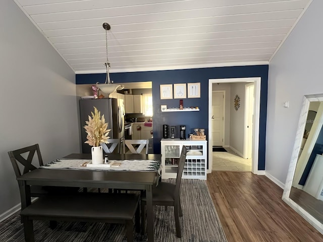 1034 Villa Ln Unit 18, Apopka, FL 32712 - dining area featuring wood finished floors and baseboards