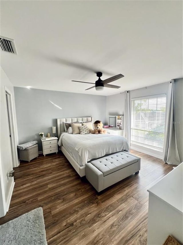 1034 Villa Ln Unit 18, Apopka, FL 32712 - bedroom featuring wood finished floors and a ceiling fan