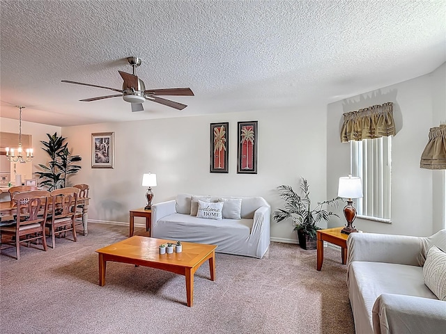 8722 Rockingham Ter Unit B, Kissimmee, FL 34747 - living area with a chandelier, light carpet, ceiling fan, and a textured ceiling