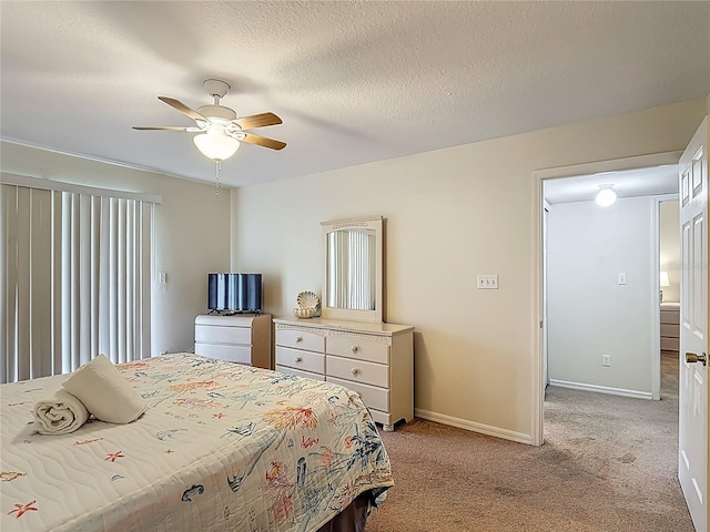 8722 Rockingham Ter Unit B, Kissimmee, FL 34747 - bedroom featuring light colored carpet and a ceiling fan