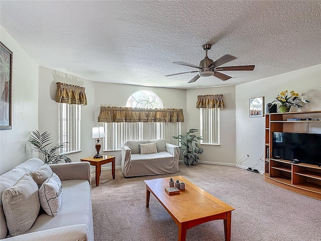 8722 Rockingham Ter Unit B, Kissimmee, FL 34747 - living room featuring carpet, ceiling fan, and a textured ceiling