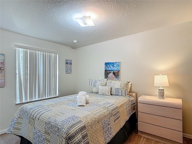 8722 Rockingham Ter Unit B, Kissimmee, FL 34747 - bedroom with carpet floors and a textured ceiling