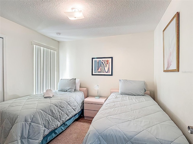 8722 Rockingham Ter Unit B, Kissimmee, FL 34747 - carpeted bedroom with a textured ceiling