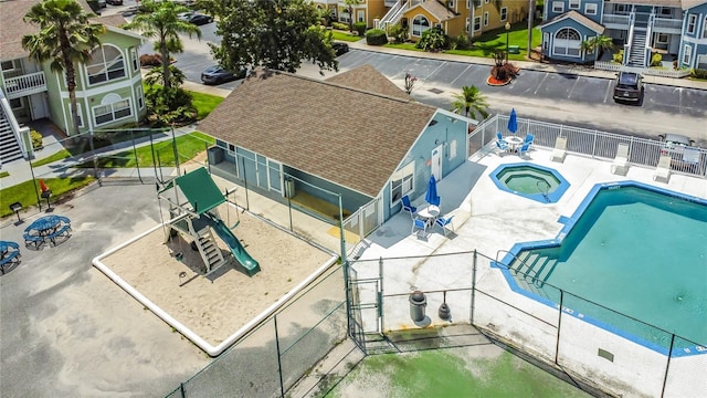 8722 Rockingham Ter Unit B, Kissimmee, FL 34747 - drone / aerial view of a pool area