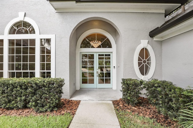 2890 Wild Ginger Ct, Winter Park, FL 32792 - property entrance with stucco siding and french doors