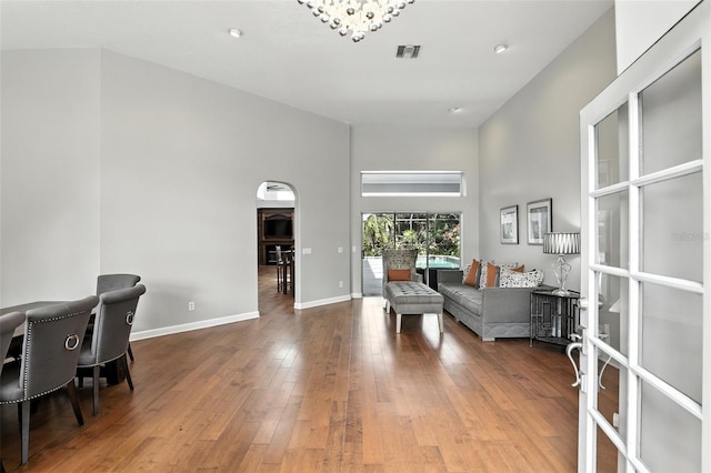 2890 Wild Ginger Ct, Winter Park, FL 32792 - living area featuring wood finished floors and a high ceiling