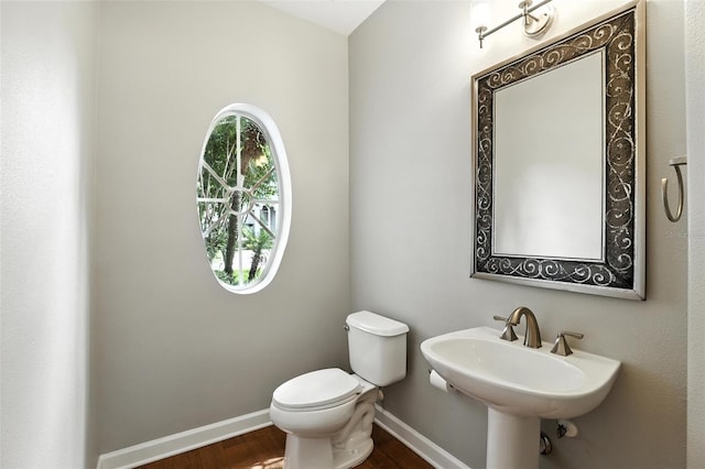 2890 Wild Ginger Ct, Winter Park, FL 32792 - bathroom with wood finished floors and toilet